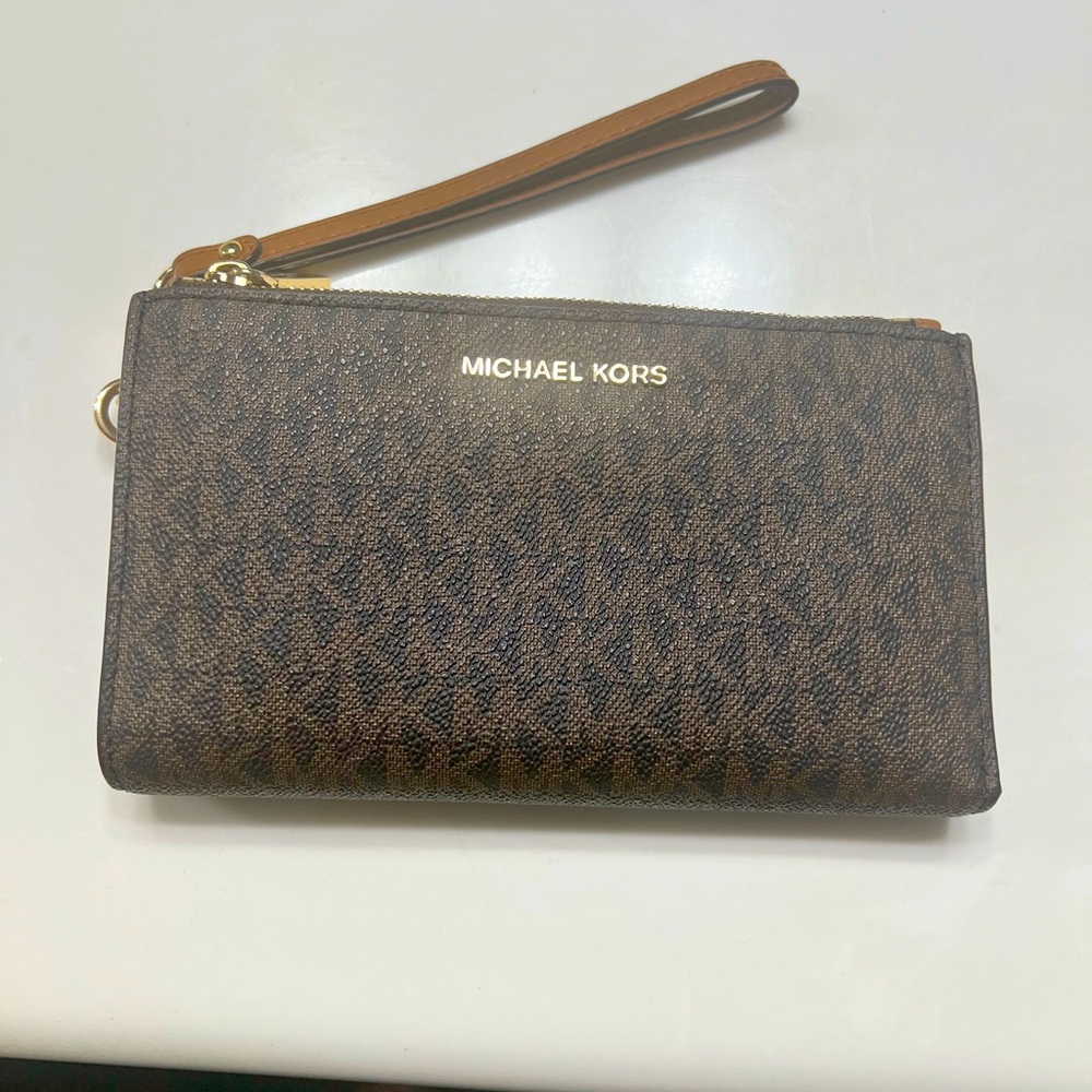 Gently used Michael Kors clutch wallet
